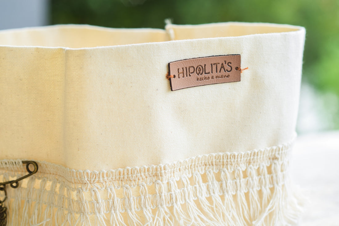 a close up of a bag with a tag on it