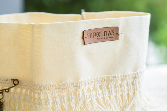 a close up of a bag with a tag on it