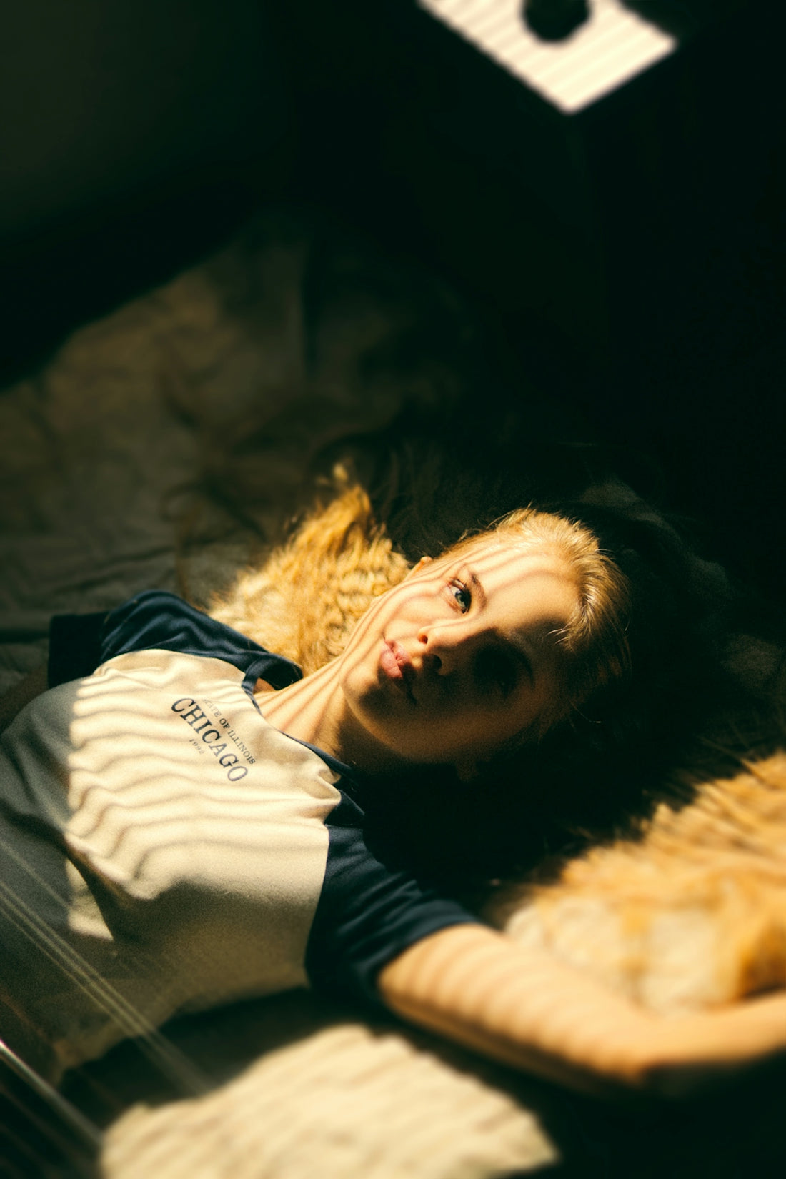 a person lying on a bed