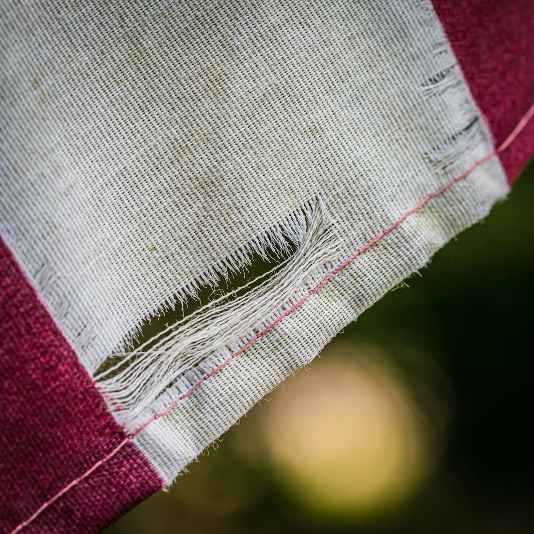 Close-up of a tattered american flag fabric